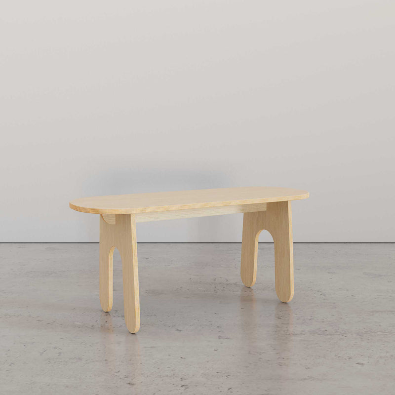 Modern bench in light wood finish with oval top, perfect for versatile seating and modern home decor.