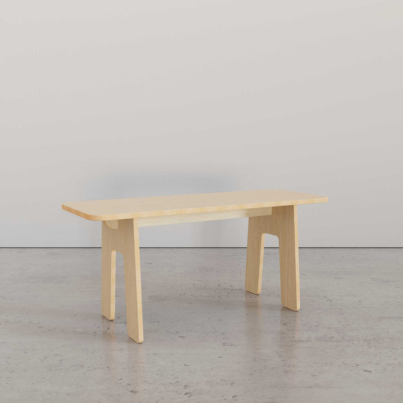 Sleek Modern Bench in light wood, showcasing minimalist design and sturdy legs, ideal for any modern living space.