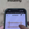 User installing unfinished wall shelves on a smartphone screen, showcasing customization options.