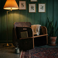 Modern Rocker in a cozy setting with warm lighting, showcasing natural wood and stylish design.